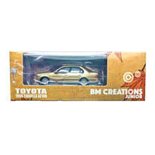 Load image into Gallery viewer, BM Creations Junior 1:64 Toyota Corolla 1996 AE100 Champagne LHD
