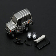 Load image into Gallery viewer, BM Creations Junior 1:64 Mitsubishi Pajero MK1 Silver LHD
