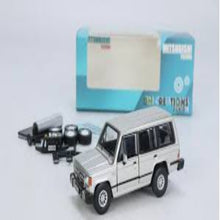 Load image into Gallery viewer, BM Creations Junior 1:64 Mitsubishi Pajero MK1 Silver LHD
