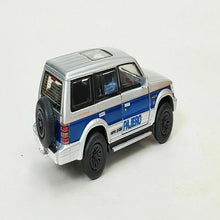 Load image into Gallery viewer, BM Creations Junior 1:64 Mitsubishi Pajero Blue Stripe
