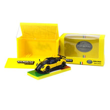 Load image into Gallery viewer, Tarmac Works 1:64 Pagani Zonda Cinque Giallo Limone with Container
