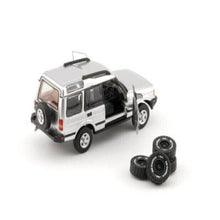 Load image into Gallery viewer, BM Creations Junior 1:64 Land Rover Discovery 1 Silver LHD

