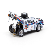 Load image into Gallery viewer, Tarmac Works 1:64 Lancia 037 Rally Safari Rally 1984 + Tomica Premium 1:64 (Random)
