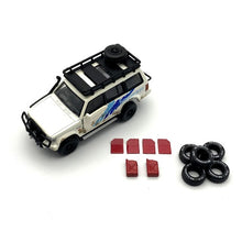 Load image into Gallery viewer, BM Creations Junior 1:64 Mitsubishi Pajero 2nd Gen (V20) Livery: JunglePack
