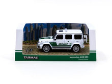 Load image into Gallery viewer, Tarmac Works 1:64 Mercedes-AMG G63 Dubai Police
