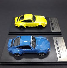 Load image into Gallery viewer, Modelcollect 1:64 RWB 930 Ducktail Wing Yellow/Blue /1500
