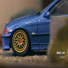 Load image into Gallery viewer, Tarmac Works 1:64 Accessories BBS LM F1 Championship Edition Gold
