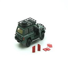 Load image into Gallery viewer, BM Creations Junior 1:64 Mitsubishi Pajero (Matte Green)

